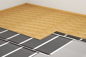 Теплый пол под ламинат: преимущества, установка и выбор системы